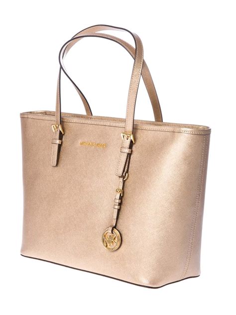 bolsa michael kors dorada